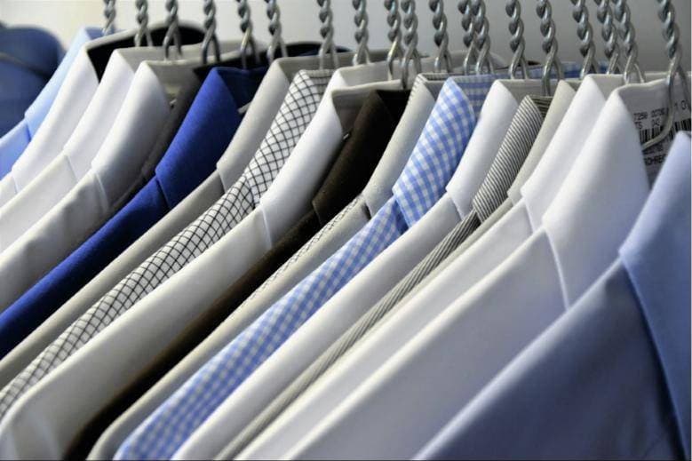Pressed dress shirts on hangers