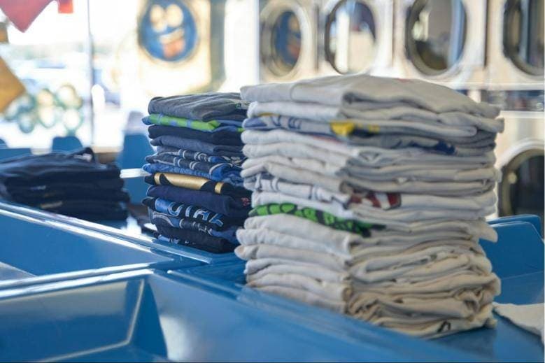 Stacks of freshly folded shirts